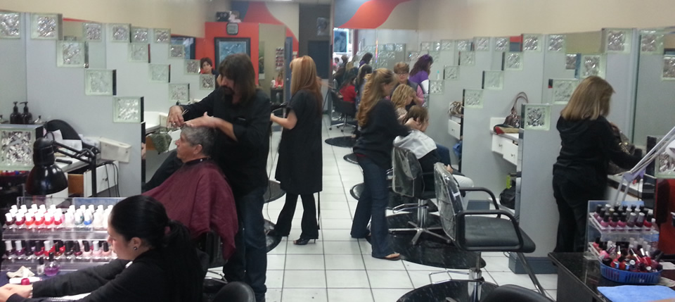 Inside of salon showing stylists and customers